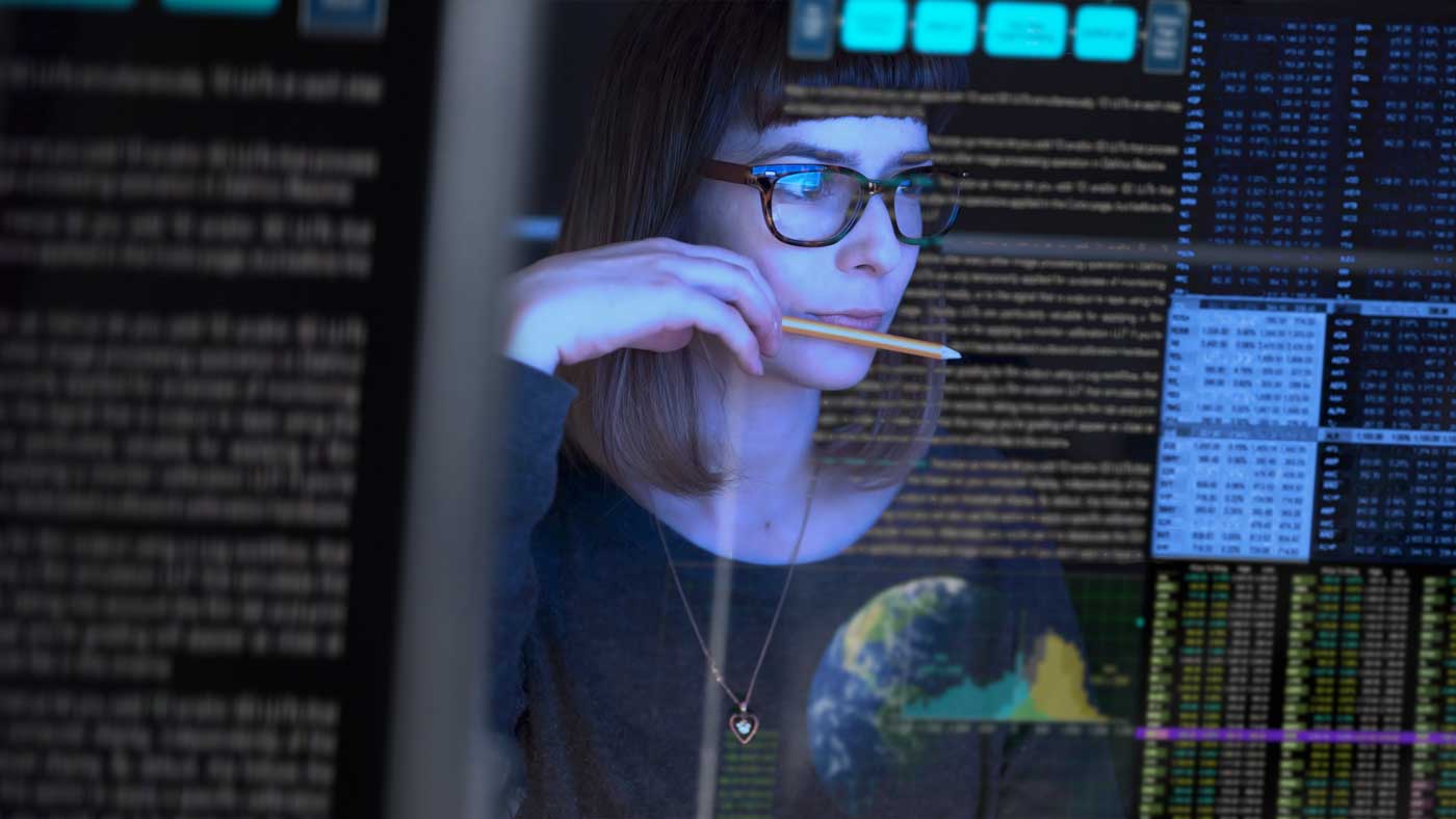 Businesswoman looking at data on a screen 01
